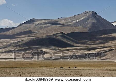 "Yurt on the Pamir Highway M41, the Pamir Mountains at the back, Gorno-Badakhshan Autonomous Province, Tajikistan, Asia" View Large Photo Image Stock Photo - "Yurt on the Pamir Highway M41, the Pamir Mountains at the back, Gorno-Badakhshan Autonomous Province, Tajikistan, Asia". Fotosearch