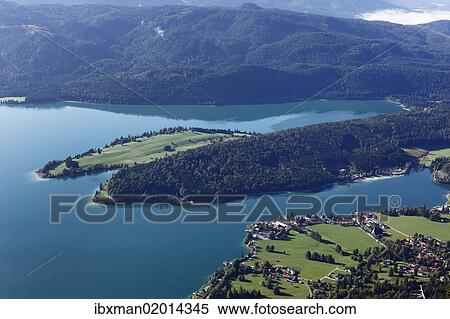 "Zwergern peninsula, Lake Walchen and the town of Walchensee, view from Herzogstand mountain, Upper Bavaria, Bavaria, Germany, Europe, PublicGround, Europe" View Large Photo Image Stock Photography - "Zwergern peninsula, Lake Walchen and the town of Walchensee, view from Herzogstand mountain, Upper Bavaria, Bavaria, Germany, Europe, PublicGround, Europe". Fotosearch