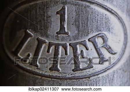 "1 liter, embossing on an aluminium can" View Large Photo Image Stock Photo - "1 liter, embossing on an aluminium can". Fotosearch