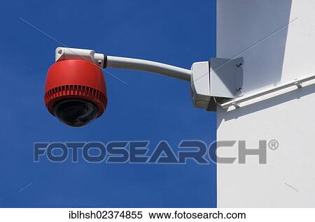 Stock Photography - "180 degree surveillance camera on the corner of a house, security, surveillance". Fotosearch