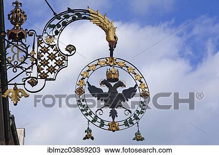 "18th century hanging sign of the former """"Schwarzer Adler"""" guesthouse, Wangen, Allgau, Bavaria, Germany, Europe" View Large Photo Image Stock Image - "18th century hanging sign of the former """"Schwarzer Adler"""" guesthouse, Wangen, Allgau, Bavaria, Germany, Europe". Fotosearch