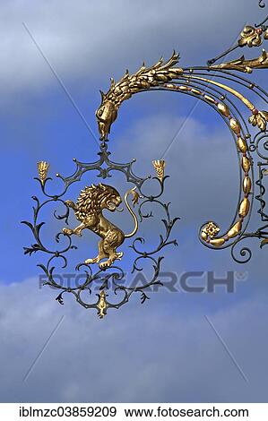 "18th century hanging sign of the former """"Goldener Lowe"""" guesthouse, Wangen, Allgau, Bavaria, Germany, Europe" View Large Photo Image Stock Photo - "18th century hanging sign of the former """"Goldener Lowe"""" guesthouse, Wangen, Allgau, Bavaria, Germany, Europe". Fotosearch