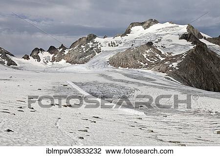 "250 x 3 meters long and 1. 70 meters high glacier table, formed by cover on the Cavardiras Glacier, behind the Oberalpstock, Graubunden, Switzerland, Europe" View Large Photo Image Stock Image - "250 x 3 meters long and 1. 70 meters high glacier table, formed by cover on the Cavardiras Glacier, behind the Oberalpstock, Graubunden, Switzerland, Europe". Fotosearch