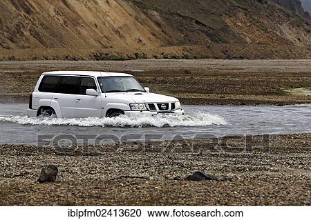 4WD car driving through water, Landmannalaugar, Iceland, Europe View Large Photo Image Stock Image - 4WD car driving through water, Landmannalaugar, Iceland, Europe. Fotosearch