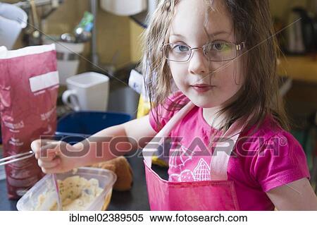 5 years old girl making cake at home View Large Photo Image Stock Photography - 5 years old girl making cake at home. Fotosearch