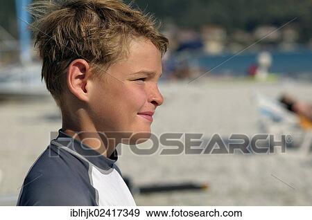 9-year-old boy standing on the beach watching the sea, Vassiliki, Lefkas, Greece, Europe View Large Photo Image Stock Photo - 9-year-old boy standing on the beach watching the sea, Vassiliki, Lefkas, Greece, Europe. Fotosearch