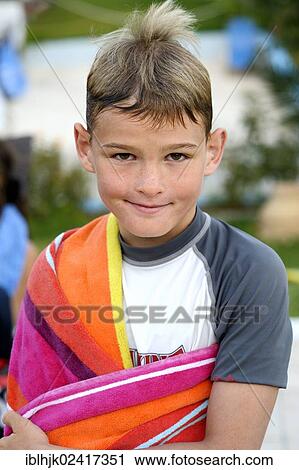 9-year-old boy with wet hair and a towel, Lefkas, Greece, Europe View Large Photo Image Stock Image - 9-year-old boy with wet hair and a towel, Lefkas, Greece, Europe. Fotosearch