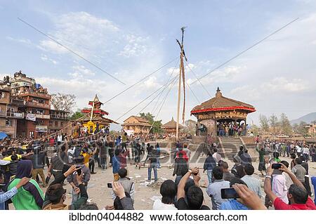 "A 25m high pole or lingam is pulled to the ground during the Bisket Jatra New Year celebrations, Bhaktapur, Nepal, Asia" View Large Photo Image Stock Image - "A 25m high pole or lingam is pulled to the ground during the Bisket Jatra New Year celebrations, Bhaktapur, Nepal, Asia". Fotosearch