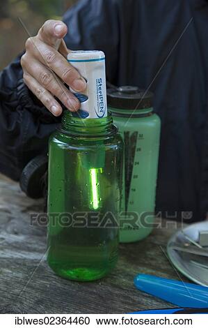 "A backcountry camper purifies water with a SteriPEN, which uses ultraviolet light to kill waterborne microbes, Algonquin Provincial Park, Ontario, Canada, North America" View Large Photo Image Stock Image - "A backcountry camper purifies water with a SteriPEN, which uses ultraviolet light to kill waterborne microbes, Algonquin Provincial Park, Ontario, Canada, North America". Fotosearch