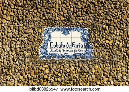 "A blue and white plate with the name of the house at the entrance of a building, Panaji, Goa, India, Asia" View Large Photo Image Stock Photo - "A blue and white plate with the name of the house at the entrance of a building, Panaji, Goa, India, Asia". Fotosearch