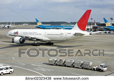 "A Boeing 777 of Japan Airlines on the apron rolling to the start, Airport Tokyo-Narita, Tokyo, Japan, Asia" View Large Photo Image Stock Photo - "A Boeing 777 of Japan Airlines on the apron rolling to the start, Airport Tokyo-Narita, Tokyo, Japan, Asia". Fotosearch
