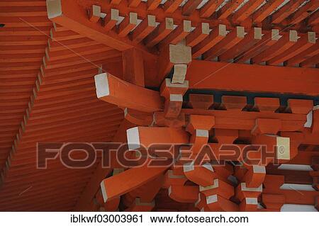 Stock Image - "A complicated truss structure under the roof of the gatehouse at the Shimogamo Shrine, Kyoto, Kinki region, Japan, Asia". Fotosearch
