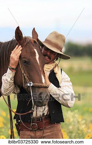 "A cowboy and his horse, Colorado, United States, North America" View Large Photo Image Stock Image - "A cowboy and his horse, Colorado, United States, North America". Fotosearch