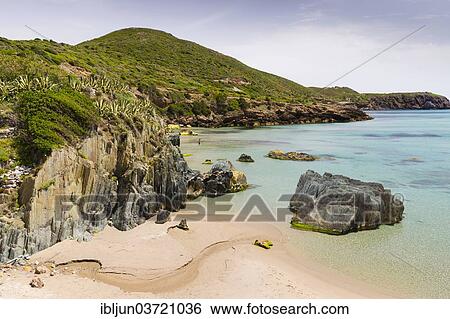 "A creek running through the sand of the Spiaggia di Planusartu bay into the sea, Masua, Iglesiente, Sardinia, Italy, Europe" View Large Photo Image Stock Photograph - "A creek running through the sand of the Spiaggia di Planusartu bay into the sea, Masua, Iglesiente, Sardinia, Italy, Europe". Fotosearch
