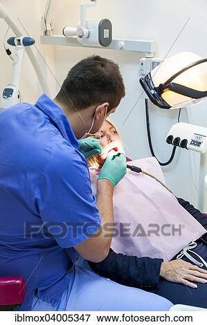 "A customer is treated professionally in a dentist's surgery for inexpensive treatment for dentures, New Belgrade, Belgrade, Serbia, Europe" View Large Photo Image Stock Photo - "A customer is treated professionally in a dentist's surgery for inexpensive treatment for dentures, New Belgrade, Belgrade, Serbia, Europe". Fotosearch