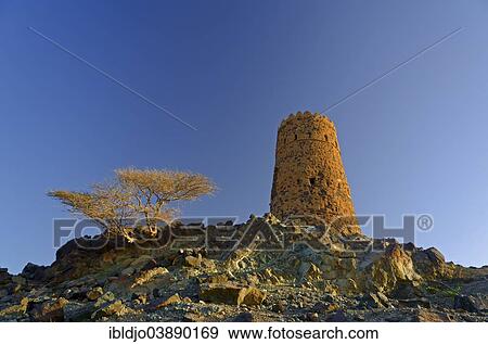 "A decaying watch tower, Al Mudayrib, Ash Sharqiyah, Oman, Asia" View Large Photo Image Stock Photo - "A decaying watch tower, Al Mudayrib, Ash Sharqiyah, Oman, Asia". Fotosearch