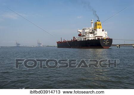 Stock Image - "A deep-sea vessel approaching the Port of Kochi, Kochi, Kerala, India, Asia". Fotosearch