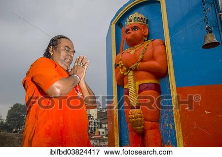 "A devotee is praying in front of a Hanuman statue, Nasik, Maharashtra, India, Asia" View Large Photo Image Stock Photo - "A devotee is praying in front of a Hanuman statue, Nasik, Maharashtra, India, Asia". Fotosearch