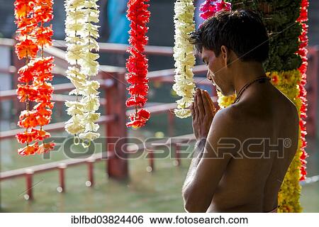Stock Photograph - "A devotee is praying, Trimbak, Maharashtra, India, Asia". Fotosearch