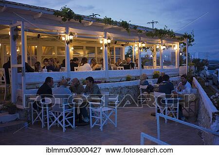 "A fish restaurant in the evening, Alacati, Izmir province, Turkey, Asia, Yumru, Alacati, Izmir Province, Aegean Region, Turkey, Asia" View Large Photo Image Stock Photo - "A fish restaurant in the evening, Alacati, Izmir province, Turkey, Asia, Yumru, Alacati, Izmir Province, Aegean Region, Turkey, Asia". Fotosearch