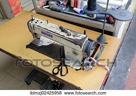 "A Fomax sewing machine in a tailor shop, Serangoon Road in the Indian district, Little India, city centre, Singapore, Asia" View Large Photo Image Stock Photo - "A Fomax sewing machine in a tailor shop, Serangoon Road in the Indian district, Little India, city centre, Singapore, Asia". Fotosearch