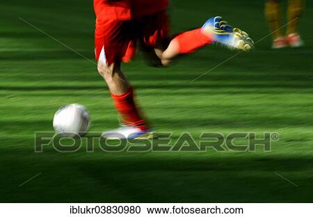 "A football player's legs with a football, Stadtwerke Dusseldorf Wintercup 2014, ESPRIT Arena, Dusseldorf, North Rhine-Westphalia, Germany, Europe" View Large Photo Image Stock Image - "A football player's legs with a football, Stadtwerke Dusseldorf Wintercup 2014, ESPRIT Arena, Dusseldorf, North Rhine-Westphalia, Germany, Europe". Fotosearch