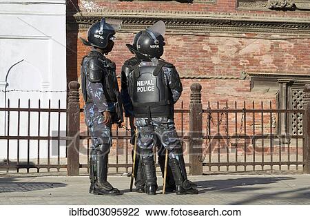 "A group of policemen observing a demonstration at Durbar Square, Kathmandu Valley, Kathmandu, Kathmandu District, Bagmati Zone, Nepal, Asia" View Large Photo Image Stock Image - "A group of policemen observing a demonstration at Durbar Square, Kathmandu Valley, Kathmandu, Kathmandu District, Bagmati Zone, Nepal, Asia". Fotosearch
