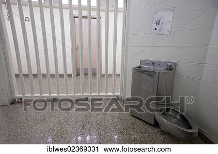 Stock Image - "A jail cell in a police station, Detroit, Michigan, USA". Fotosearch