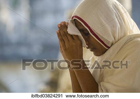 "A Jain nun praying at a temple, Palitana, Gujarat, India, Asia" View Large Photo Image Stock Image - "A Jain nun praying at a temple, Palitana, Gujarat, India, Asia". Fotosearch