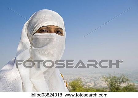 "A Jain pilgrim woman, her face covered with white cloth, Palitana, Gujarat, India, Asia" View Large Photo Image Stock Photo - "A Jain pilgrim woman, her face covered with white cloth, Palitana, Gujarat, India, Asia". Fotosearch