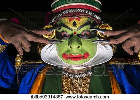 "A Katakali with the complete make up of the character Krishna for the Santhana Gopalam play during a temple festival, Ayroor, Kerala, India, Asia" View Large Photo Image Stock Photo - "A Katakali with the complete make up of the character Krishna for the Santhana Gopalam play during a temple festival, Ayroor, Kerala, India, Asia". Fotosearch