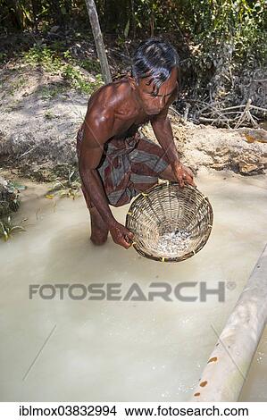 "A labourer washing sand to win moonstones, Moonstone Mine, Nindana, Southern Province, Eranawila Region, Sri Lanka, Asia" View Large Photo Image Picture - "A labourer washing sand to win moonstones, Moonstone Mine, Nindana, Southern Province, Eranawila Region, Sri Lanka, Asia". Fotosearch