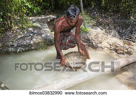 "A labourer washing sand to win moonstones, Moonstone Mine, Nindana, Southern Province, Eranawila Region, Sri Lanka, Asia" View Large Photo Image Stock Image - "A labourer washing sand to win moonstones, Moonstone Mine, Nindana, Southern Province, Eranawila Region, Sri Lanka, Asia". Fotosearch