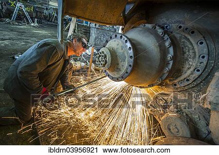 "A man cutting up an armored vehicle type Marder with a torch, Rockensussra, Thuringia, Germany, Europe" View Large Photo Image Stock Image - "A man cutting up an armored vehicle type Marder with a torch, Rockensussra, Thuringia, Germany, Europe". Fotosearch