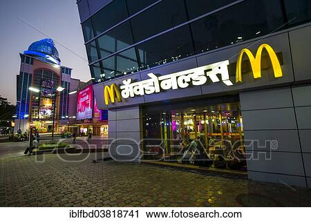 "A McDonalds restaurant in a new and colorfully illuminated shopping mall, Mumbai, Maharashtra, India, Asia" View Large Photo Image Stock Image - "A McDonalds restaurant in a new and colorfully illuminated shopping mall, Mumbai, Maharashtra, India, Asia". Fotosearch