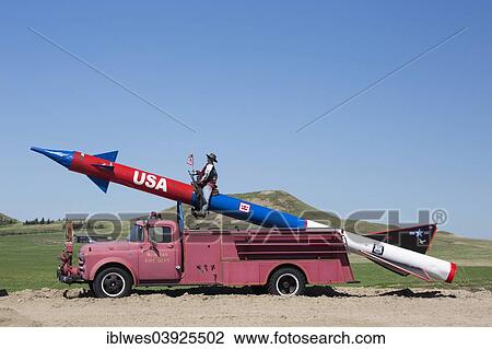 Stock Image - "A missile mounted on an antique fire truck, Bowman, North Dakota, United States, North America". Fotosearch