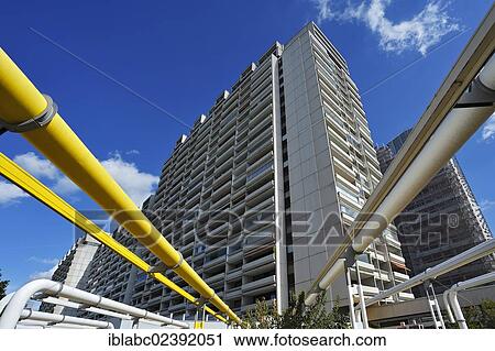 "A multistorey building and supply pipes in the former Olympic Village, Munich, Bavaria, Germany, Europe" View Large Photo Image Stock Image - "A multistorey building and supply pipes in the former Olympic Village, Munich, Bavaria, Germany, Europe". Fotosearch