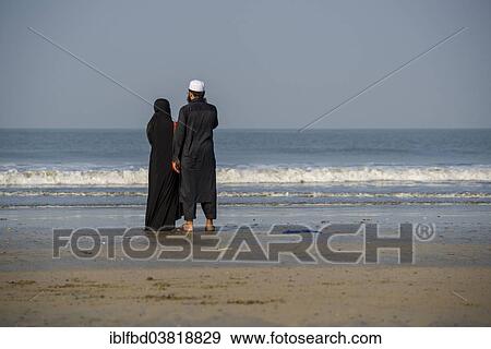"A Muslim couple is standing at Juhu Beach, Mumbai, Maharashtra, India, Asia" View Large Photo Image Stock Photo - "A Muslim couple is standing at Juhu Beach, Mumbai, Maharashtra, India, Asia". Fotosearch