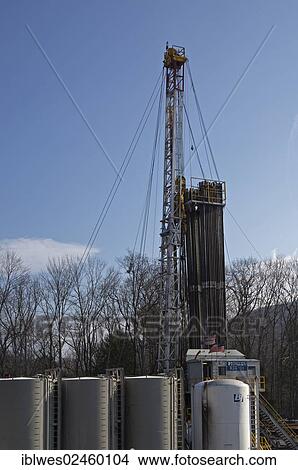 Picture - "A natural gas well being drilled in rural Lycoming County in preparation for hydraulic fracturing or fracking, Williamsport, Pennsylvania, United States, North America". Fotosearch