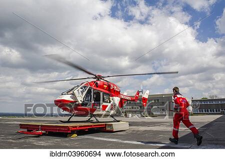 "A paramedic running to a rescue helicopter of the DRF air rescue, Dortmund, North Rhine-Westphalia, Germany, Europe" View Large Photo Image Picture - "A paramedic running to a rescue helicopter of the DRF air rescue, Dortmund, North Rhine-Westphalia, Germany, Europe". Fotosearch
