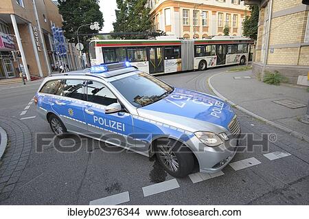 "A police patrol car is blocking a road, Esslingen, Baden-Wuerttemberg, Germany, Europe" View Large Photo Image Picture - "A police patrol car is blocking a road, Esslingen, Baden-Wuerttemberg, Germany, Europe". Fotosearch