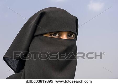 "A portrait of a Muslim woman dressed in the traditional black chador, Mumbai, Maharashtra, India, Asia" View Large Photo Image Stock Photography - "A portrait of a Muslim woman dressed in the traditional black chador, Mumbai, Maharashtra, India, Asia". Fotosearch