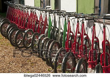 "A row of downhill scooters, Oytal valley near Oberstdorf, Allgaeu Alps, Oberallgaeu district, Bavaria, Germany, Europe, PublicGround, Europe" View Large Photo Image Stock Photograph - "A row of downhill scooters, Oytal valley near Oberstdorf, Allgaeu Alps, Oberallgaeu district, Bavaria, Germany, Europe, PublicGround, Europe". Fotosearch