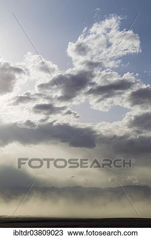 "A sand storm over the Mesquite Flat Sand Dunes and the Panamint Range in the evening, Death Valley, Death Valley National Park, California, USA" View Large Photo Image Stock Image - "A sand storm over the Mesquite Flat Sand Dunes and the Panamint Range in the evening, Death Valley, Death Valley National Park, California, USA". Fotosearch