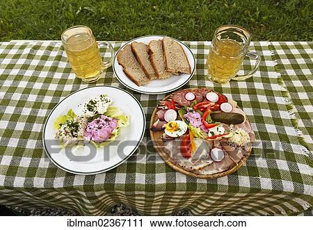 "A sausage and cheese platter and some spread on a plate with two glasses of cider, young wine, near Gruenberg, Pyhrn-Eisenwurzen, Traunviertel region, Upper Austria, Austria, Europe" View Large Photo Image Stock Image - "A sausage and cheese platter and some spread on a plate with two glasses of cider, young wine, near Gruenberg, Pyhrn-Eisenwurzen, Traunviertel region, Upper Austria, Austria, Europe". Fotosearch