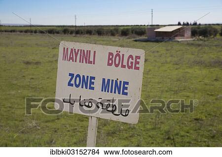Picture - "A sign warning of land mines on the Syrian-Turkish border, nahe Bab al-Salameh, Azaz, Aleppo, Syria, Asia". Fotosearch