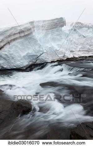 "A small waterfall under a thick layer of ice, Nordwest Halbinsel, Iceland, Europe" View Large Photo Image Stock Image - "A small waterfall under a thick layer of ice, Nordwest Halbinsel, Iceland, Europe". Fotosearch