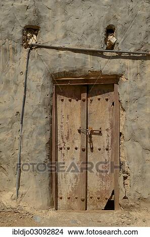"A small wooden door, Al Hazm Castle, Al Hazm, Al Batinah, Oman, Asia" View Large Photo Image Picture - "A small wooden door, Al Hazm Castle, Al Hazm, Al Batinah, Oman, Asia". Fotosearch