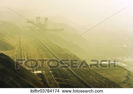 Picture - "A spreader at the Garzweiler open cast mine in autumn, Grevenbroich, North Rhine-Westphalia, Germany, Europe". Fotosearch