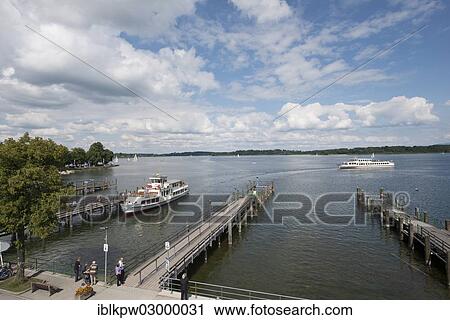 "A steamboat at a landing stage on lake Chiemsee, Insel Herrenchiemsee, Prien am Chiemsee, Bavaria, Germany, Europe" View Large Photo Image Stock Image - "A steamboat at a landing stage on lake Chiemsee, Insel Herrenchiemsee, Prien am Chiemsee, Bavaria, Germany, Europe". Fotosearch